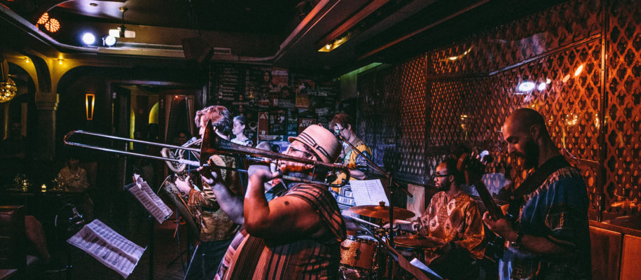 Afro Yaqui Music Collective performing at a club