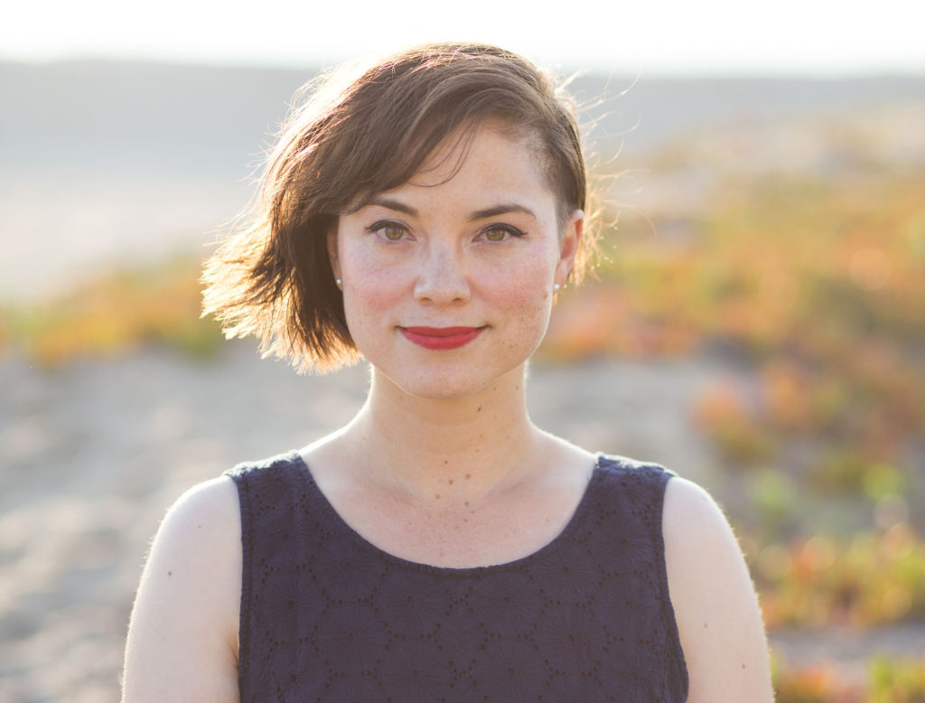 Jennifer Jolley standing near a lake