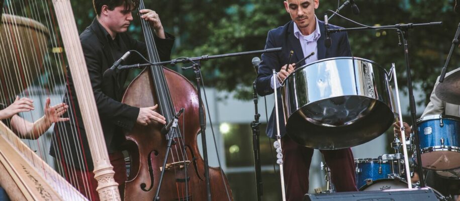 Andy Akiho performing on steel pans along with harp and double bass during the June 10, 2016 IN/TER\SECT concert in Bryant Park